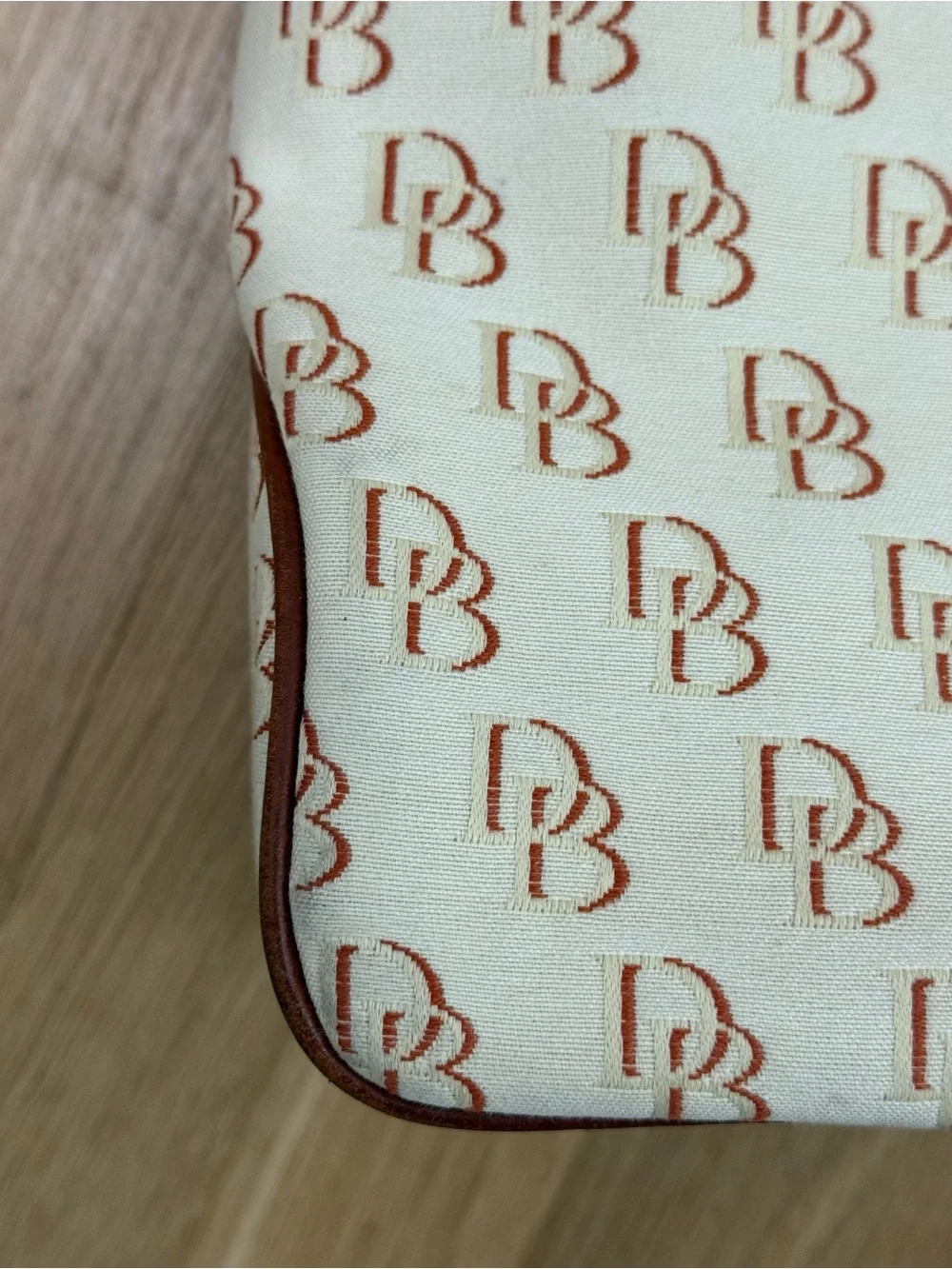 Dooney & Bourke Cream/Brown Signature Logo Lock Canvas Hobo Shoulder Bag